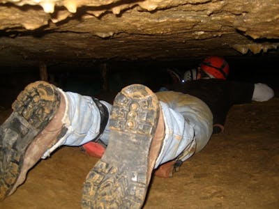 bottoms of shoes or boots as participant crawls through the Masher